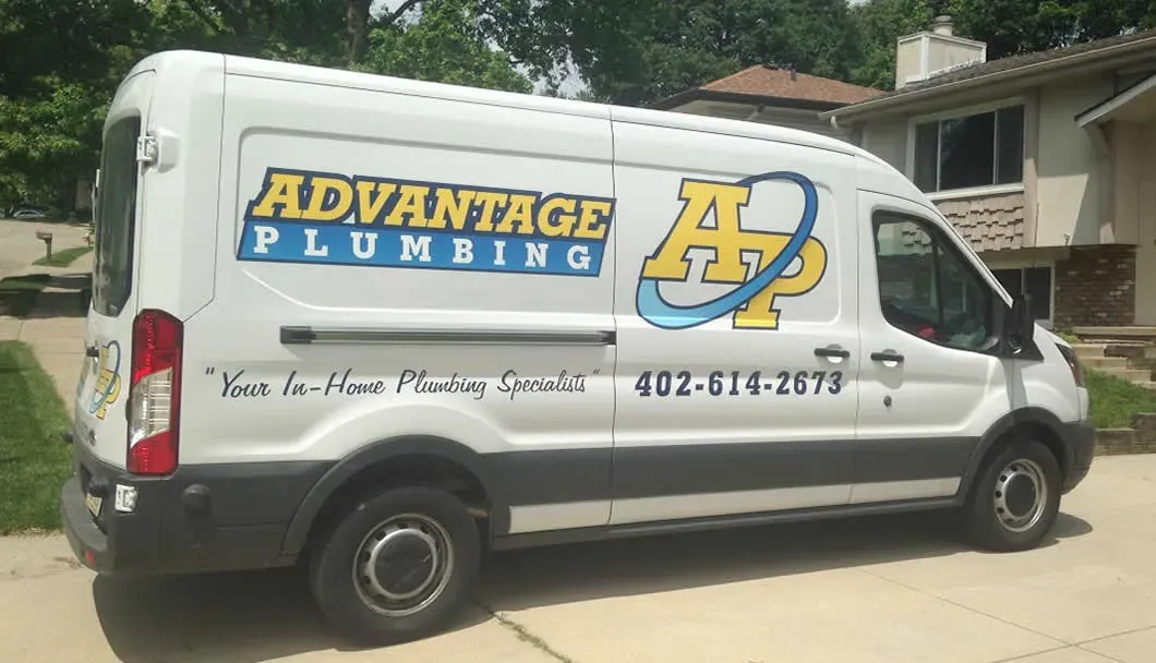 Advantage Plumbing service van parked outside a customer’s home